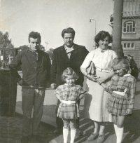 Walking with her parents, older sister Dorota and big cousin, Markéta in the middle left, Prague, 1957