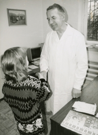 Arnošt Obrusník receives congratulations from a child after a primary school excursion to the bakery in Dolní Benešov sometime in the late 1990s