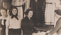 Rajisa Kamlerová's aunt, Emílie Glancová, née Najmanová, in her tailoring workshop in Český Malín, 1940s