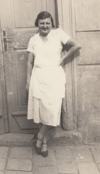 Marie Valová - mother of the witness in front of her house in Kroměříž, 1940s