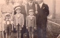 From the left: the witness, brothers Oldrich and František, mother in the middle, early 1950s