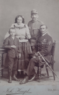 Sister of Mrs. Petrova's grandmother with her husband and children, taken during World War I.