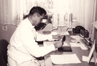 Adolf Lick in the office of the hospital director, 1975