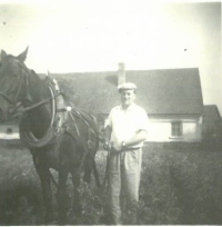 Blahomír Sr., father, while ploughing potatoes with his horse Frajerka, about 1952