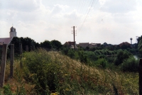 Concrete posts of the signal wall on the Czechoslovak border with Austria in Záhorská Ves, summer 1990