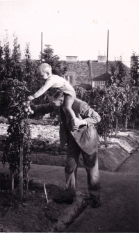 Michal Wagner with his father in the garden