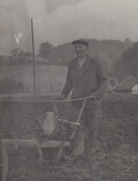 Father Josef Matějka at work in the field