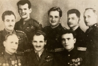 Kpt. Josef Otisk (bottom center), Robert Matula, Josef Černota and partisans