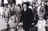 Leopoldina Čermáková with her grandchildren in the May Day parade in Mnichovo Hradiště, 1976