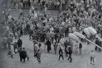 1988 Pavel Záleský dragged by SNB officers / Gathering for the release of Augustin Navrátil from a psychiatric hospital / Olomouc, Commentary by the witness: "The gentleman with the bag in front of me is my father. He shouted at me not to do anything to them. I replied that I wasn't doing anything to them, they were doing it to me!" / photo by Oldřich Kučera