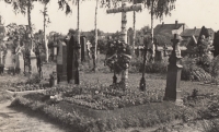 Provisional tombstone of 14 victims of the uprising from Kožušany at the cemetery in Charvati