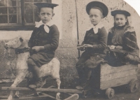 Father Ján Dokupil as a child on the left, his brother, and a friend