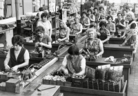 Production workshop with belt production in Branec Ironworks during assembly of locks. Jarmila Chovancová is in the left row, fifth in order, 1970s