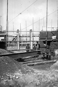 Father Josef Matuska, second from the left, at the construction site in Kiel harbour in 1941