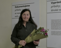 Alena Dixon with flowers as a thank you for the filming of 23 February 2024