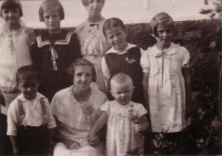 Trčka siblings at Třebsko 15: František (second left, bottom row), Růžena (second left, top row) and Petr (second right, top right), 1935