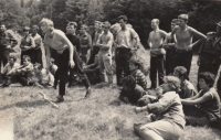 Ladislav Kukla with his friends during the suppression, axe throwing