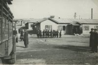 The second group of DKNS waiting for their train to leave on April 10, 1955 at Kaesong station.