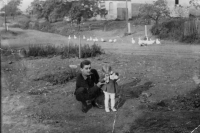 Geese on the village square in Podbořanský Rohozec, Naděžda Gutzerová with her father Rudolf Gutzer around 1967