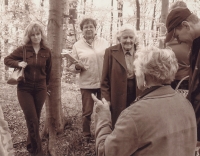 In the forest near the picture of the Virgin Mary in Bukovina in May 2005. From left: Miroslava Raidová, Rostislava Raidová with her mother Anna Soudková, the pointing woman with her back to the camera is Marie Fajková