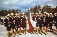 Irena Tichá (second from the right of the flag) in the assembly area during the Summer Olympic Games in Mexico, 1968