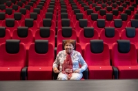 A staged portrait of the witness Rostislava Raidová in Orion cinema in Hradec in 2024