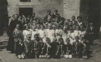 Miloslava Kořínková in a group photo from her First Holy Communion at the Church of St. Vitus in Zahrádka.