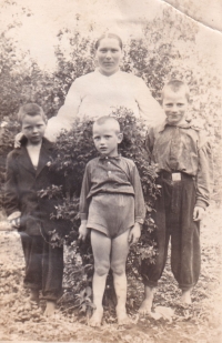 Grandmother Nadiia Denysiuk with her sons. Zhovtneve village (Popivka), Vinnytsia region, 1950s