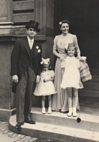 With parents and younger sister Emina, Prague, 1940s