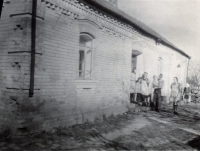 Glajch in front of his house in Straklov