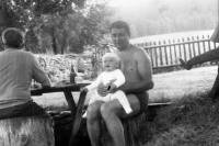 Vilibald Plaček with his granddaughter Lucie, 1987