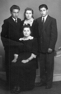 Vilibald Plaček on the right, with his brother Karel, sister Anna and mother Marie, 1954