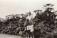 In front of bolshevik plants with her mother Jitka Gutzerová, her cousin Maria (left) and her brother Martin (right) in the early 1970s