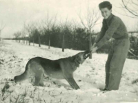 Jiří Hübner in his childhood with a dog