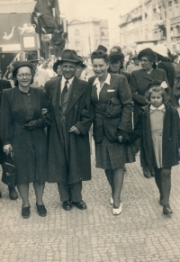 With her mother and father in Prague in 1947