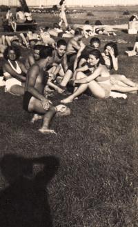 Pavol (in the middle) by the swimming pool